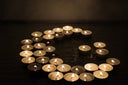 Symbols of Islam. Candle lights on black background. Abstract isolated photo