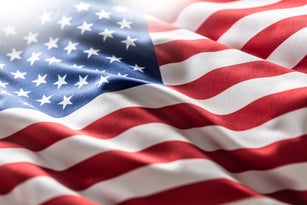 American flag blowing in the wind.