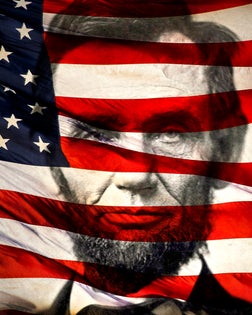 American flag superimposed over portrait of Abraham Lincoln