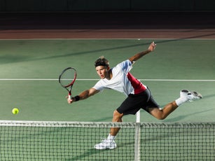 Young man playing tennis